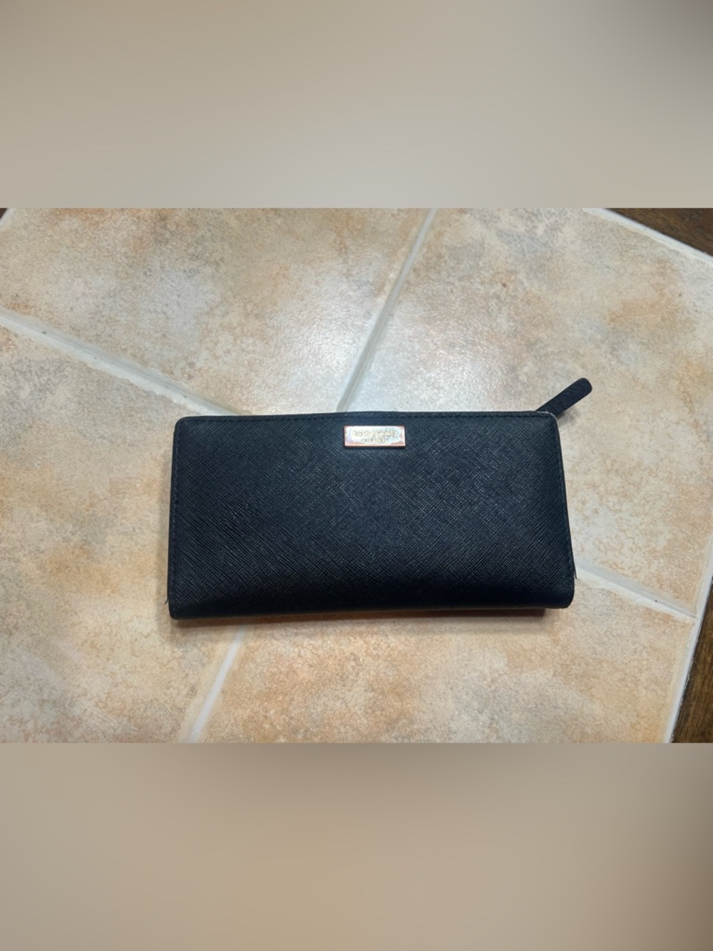 kate spade black leather wallet with gold plaque